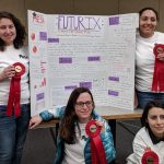 Clark student with MESA group holding second-place ribbons